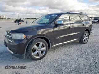 2013 Dodge Durango Citadel with VIN 1C4SDJET6DC561832, listed as a Copart auction lot 65965085 with 126,630 mi miles and Salvage title. Bid and sale history available at DreamBid. Image 1.