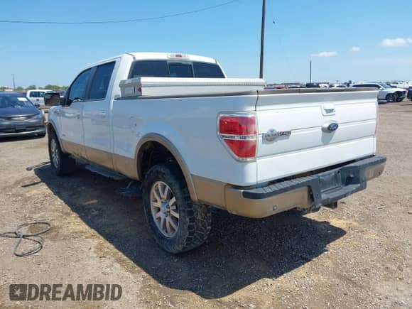 2013 Ford F-150 XL with VIN 1FTFW1ET7DKE92571, listed as a IAAI auction lot 43043049 with 214,649 mi miles and . Bid and sale history available at DreamBid. Image 3.