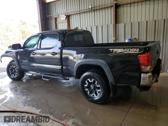 2017 Toyota Tacoma TRD Off Road z VIN 3TMDZ5BN7HM030425, wystawiony jako Copart lot #86318985 z przebiegiem 69 572 mil mil oraz Szkoda całkowita • Salvage title. Historia ofert i sprzedaży dostępna na DreamBid. Obrazek 2.