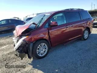 2016 Toyota Sienna XLE with VIN 5TDYK3DC0GS739900, listed as a Copart auction lot 86808385 with 107,611 mi miles and Salvage title. Bid and sale history available at DreamBid. Image 1.