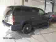 2014 Chevrolet Tahoe Commercial z VIN 1GNLC2E07ER213191, wystawiony jako IAAI lot #43243599 z przebiegiem 141 185 mil mil oraz . Historia ofert i sprzedaży dostępna na DreamBid. Obrazek 4.