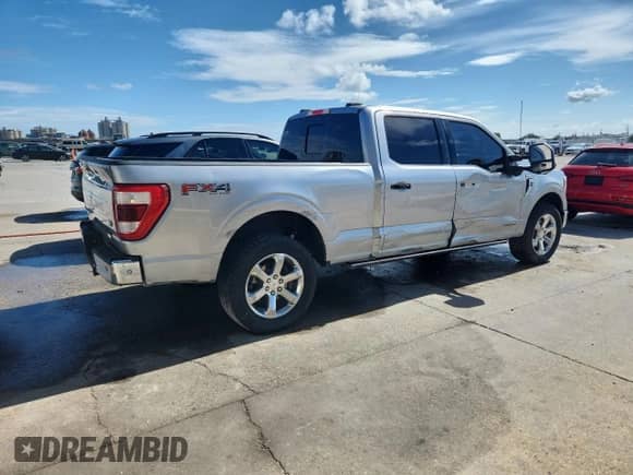 2023 Ford F-150 XL с VIN 1FTFW1ED7PFB41827, выставлен на аукционе Copart как лот 85182175 с пробегом 71 509 миль миль и Списание • Salvage title. История ставок и продаж доступна на DreamBid. Изображение 3.