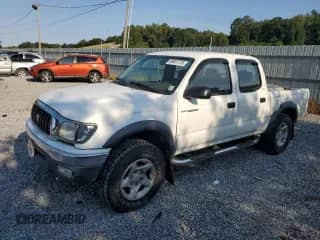2002 Toyota Tacoma PreRunner with VIN 5TEGN92N82Z887654, listed as a Copart auction lot 68931775 with 257,474 mi miles and Salvage title. Bid and sale history available at DreamBid. Image 1.