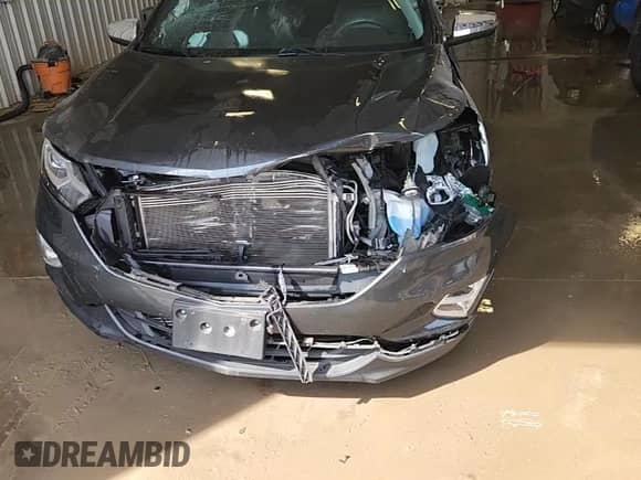 2018 Chevrolet Equinox Premier with VIN 3GNAXMEV3JS542562, listed as a Copart auction lot 80189265 with 133,584 mi miles and Salvage title. Bid and sale history available at DreamBid. Image 14.