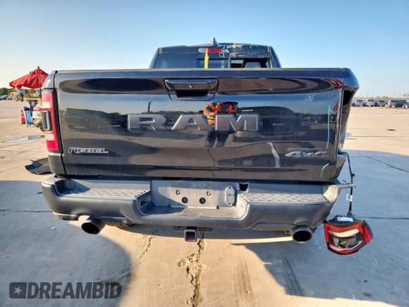 2020 Ram 1500 Rebel z VIN 1C6SRFLT0LN357023, wystawiony jako Copart lot #69025675 z przebiegiem 114 804 mil mil oraz Szkoda całkowita • Salvage title. Historia ofert i sprzedaży dostępna na DreamBid. Obrazek 6.