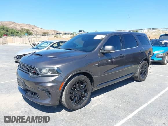 2021 Dodge Durango R/T with VIN 1C4SDJCT4MC716350, listed as a IAAI auction lot 43144527 with 52,046 mi miles and . Bid and sale history available at DreamBid. Image 2.