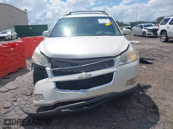 2011 Chevrolet Traverse LTZ with VIN 1GNKRLED6BJ357487, listed as a IAAI auction lot 42829333 with 197,385 mi miles and . Bid and sale history available at DreamBid. Image 12.