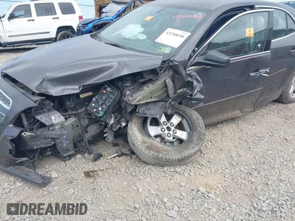 2013 Chevrolet Malibu LS with VIN 1G11B5SA9DF335660, listed as a IAAI auction lot 43240698 with 64,984 mi miles and . Bid and sale history available at DreamBid. Image 6.