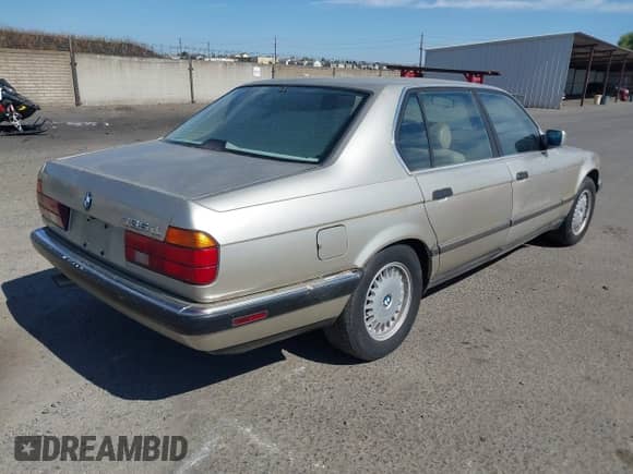 1990 BMW 7 Series with VIN WBAGC4319LDC26553, listed as a IAAI auction lot 42500355 with 344,905 mi miles and . Bid and sale history available at DreamBid. Image 4.