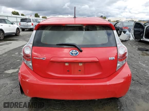2014 Toyota Prius One z VIN JTDKDTB34E1569568, wystawiony jako Copart lot #82497155 z przebiegiem Nie podano mil oraz Szkoda całkowita • Salvage title. Historia ofert i sprzedaży dostępna na DreamBid. Obrazek 6.