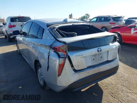 2017 Toyota Prius Two z VIN JTDKBRFU6H3567132, wystawiony jako IAAI lot #43173871 z przebiegiem 101 878 mil mil oraz . Historia ofert i sprzedaży dostępna na DreamBid. Obrazek 3.
