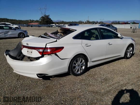 2013 Hyundai Azera с VIN KMHFG4JG5DA200828, выставлен на аукционе Copart как лот 79511064 с пробегом 93 478 миль миль и Списание • Salvage title. История ставок и продаж доступна на DreamBid. Изображение 3.