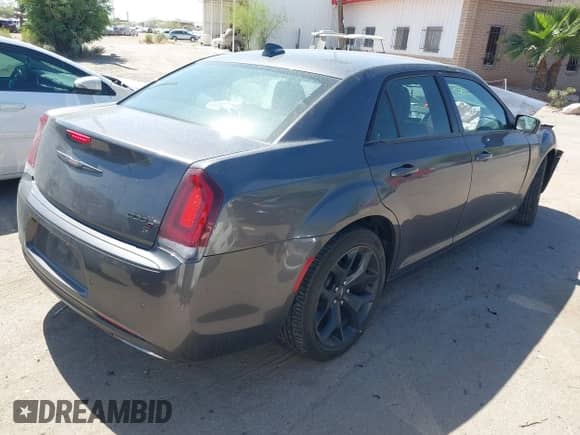 2021 Chrysler 300 S with VIN 2C3CCABG1MH629812, listed as a IAAI auction lot 42272423 with 77,816 mi miles and . Bid and sale history available at DreamBid. Image 4.