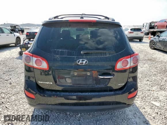 2012 Hyundai Santa Fe Limited с VIN 5XYZK3AB8CG140539, выставлен на аукционе Copart как лот 80707075 с пробегом 199 360 миль миль и Списание • Salvage title. История ставок и продаж доступна на DreamBid. Изображение 6.