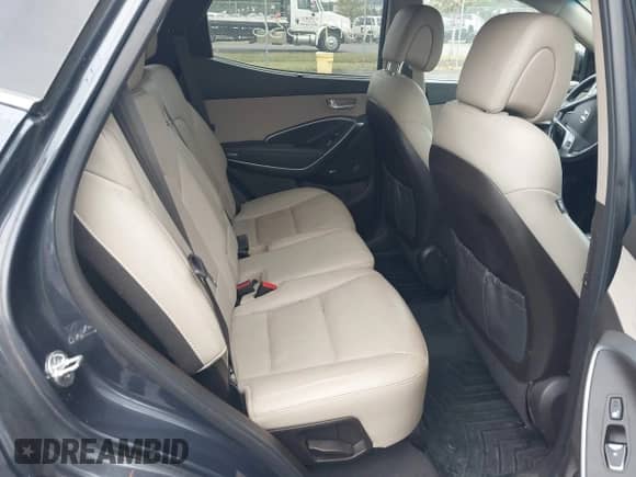 2017 Hyundai Santa Fe Ultimate with VIN 5XYZWDLA7HG498799, listed as a IAAI auction lot 43192336 with 95,204 mi miles and . Bid and sale history available at DreamBid. Image 8.