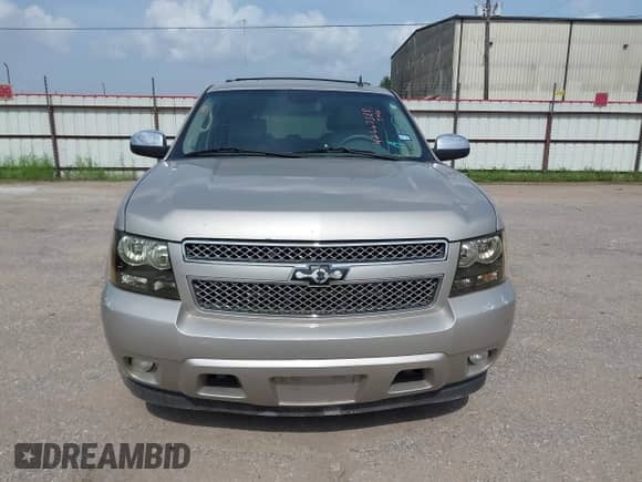 2009 Chevrolet Tahoe LTZ with VIN 1GNFC33009R217272, listed as a IAAI auction lot 42667388 with 199,795 mi miles and . Bid and sale history available at DreamBid. Image 12.