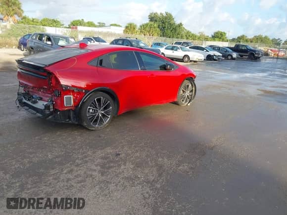 2024 Toyota Prius LE with VIN JTDACAAU7R3023449, listed as a IAAI auction lot 43136259 with 31,158 mi miles and . Bid and sale history available at DreamBid. Image 4.