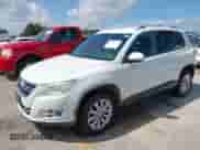 2011 Volkswagen Tiguan SE with VIN WVGAV7AX6BW557338, listed as a IAAI auction lot 42726724 with 175,004 mi miles and . Bid and sale history available at DreamBid. Image 2.