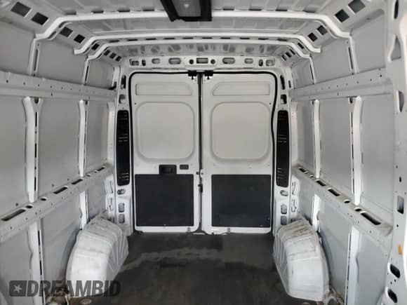 2025 Ram ProMaster Cargo Tradesman с VIN 3C6LRVDG1SE521527, выставлен на аукционе Copart как лот 90949705 с пробегом 35 538 миль миль и Списание • Salvage title. История ставок и продаж доступна на DreamBid. Изображение 10.