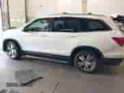 2018 Honda Pilot EX-L with VIN 5FNYF5H57JB031523, listed as a IAAI auction lot 43169866 with 109,412 mi miles and . Bid and sale history available at DreamBid. Image 14.