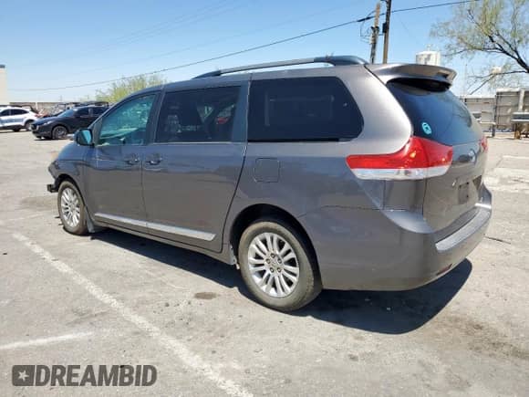 2011 Toyota Sienna XLE AAS with VIN 5TDYK3DC9BS147193, listed as a Copart auction lot 66310535 with 208,252 mi miles and Salvage title. Bid and sale history available at DreamBid. Image 2.