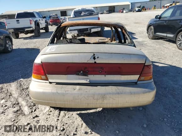 1996 Saturn SL with VIN 1G8ZK5271TZ266193, listed as a Copart auction lot 73555934 with Not provided miles and Salvage title. Bid and sale history available at DreamBid. Image 6.