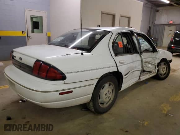 1995 Chevrolet Lumina с VIN 2G1WL52M7S1102989, выставлен на аукционе Copart как лот 62636134 с пробегом Не указан миль и Списание • Salvage title. История ставок и продаж доступна на DreamBid. Изображение 3.