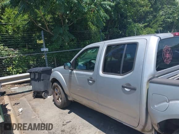 2009 Nissan Frontier SE with VIN 1N6AD07U59C407404, listed as a IAAI auction lot 42772182 with 183,640 mi miles and . Bid and sale history available at DreamBid. Image 14.