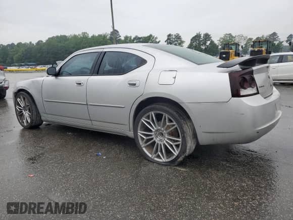 2010 Dodge Charger R/T with VIN 2B3CA5CT6AH115150, listed as a Copart auction lot 59514445 with 163,080 mi miles and Salvage title. Bid and sale history available at DreamBid. Image 2.