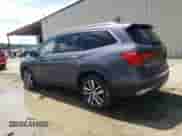 2018 Honda Pilot Touring z VIN 5FNYF6H99JB069585, wystawiony jako Copart lot #64240475 z przebiegiem 141 975 mil mil oraz Szkoda całkowita • Salvage title. Historia ofert i sprzedaży dostępna na DreamBid. Obrazek 2.