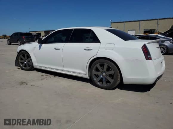 2014 Chrysler 300 SRT-8 с VIN 2C3CCAFJ5EH230747, выставлен на аукционе Copart как лот 73540564 с пробегом 29 458 миль миль и Списание • Salvage title. История ставок и продаж доступна на DreamBid. Изображение 2.