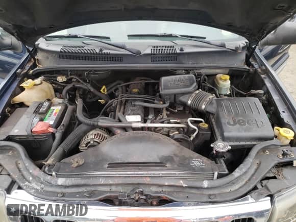 2002 Jeep Grand Cherokee с VIN 1J4GX38S42C229150, выставлен на аукционе Copart как лот 72586834 с пробегом 201 103 миль миль и Списание • Salvage title. История ставок и продаж доступна на DreamBid. Изображение 11.