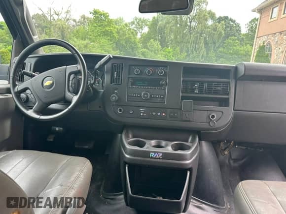 2021 Chevrolet Express Passenger LS с VIN 1GAZGNFPXM1170072, выставлен на аукционе Copart как лот 64797015 с пробегом 273 908 миль миль и Чистый • Clean title. История ставок и продаж доступна на DreamBid. Изображение 8.