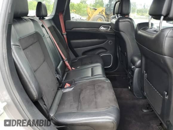 2018 Jeep Grand Cherokee Trackhawk z VIN 1C4RJFN92JC318555, wystawiony jako Copart lot #60436545 z przebiegiem 58 628 mil mil oraz Czysty tytuł • Clean title. Historia ofert i sprzedaży dostępna na DreamBid. Obrazek 11.