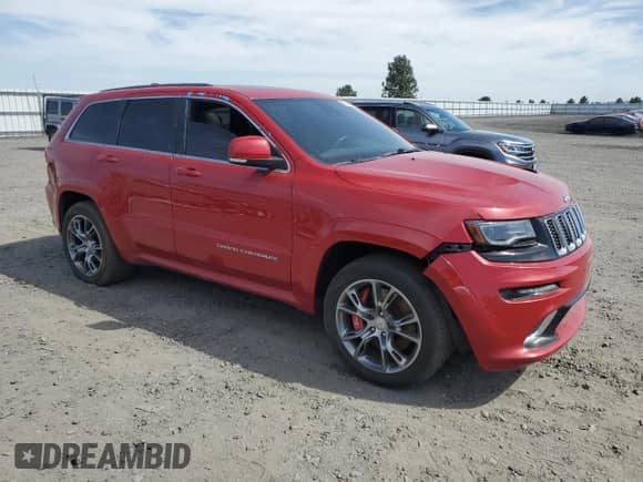 2014 Jeep Grand Cherokee SRT-8 z VIN 1C4RJFDJ5EC340647, wystawiony jako Copart lot #62144645 z przebiegiem Nie podano mil oraz Czysty tytuł • Clean title. Historia ofert i sprzedaży dostępna na DreamBid. Obrazek 4.