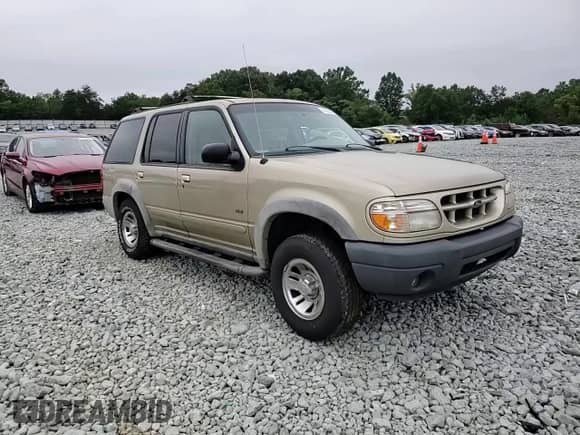 2000 Ford Explorer XLS with VIN 1FMZU72X0YZB45945, listed as a Copart auction lot 69550585 with 154,617 mi miles and Salvage title. Bid and sale history available at DreamBid. Image 14.