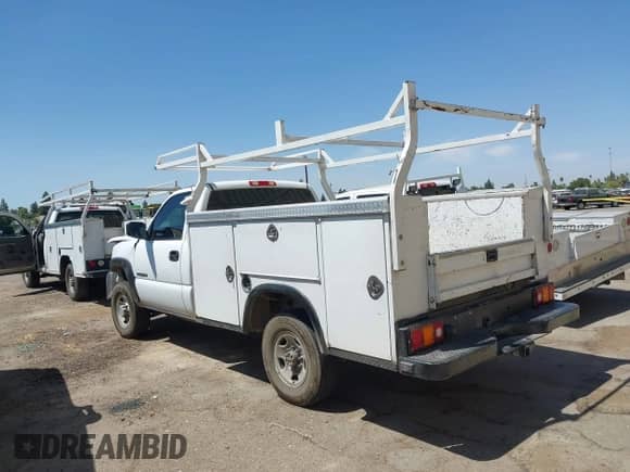2005 Chevrolet Silverado 2500HD Work Truck with VIN 1GBHC24U45E226673, listed as a IAAI auction lot 42975891 with 254,063 mi miles and . Bid and sale history available at DreamBid. Image 3.