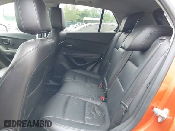 2015 Chevrolet Trax LTZ z VIN KL7CJNSB7FB229386, wystawiony jako IAAI lot #42365663 z przebiegiem 125 619 mil mil oraz . Historia ofert i sprzedaży dostępna na DreamBid. Obrazek 8.