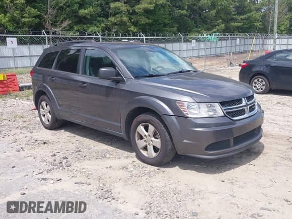 2014 Dodge Journey SE with VIN 3C4PDDAG2ET227108, listed as a IAAI auction lot 42829874 with 169,490 mi miles and . Bid and sale history available at DreamBid. Image 1.