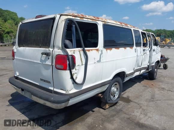 2001 Dodge Passenger with VIN 2B5WB35Z01K521693, listed as a IAAI auction lot 42443063 with 165,064 mi miles and . Bid and sale history available at DreamBid. Image 4.