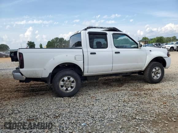 2001 Nissan Frontier SE with VIN 1N6ED27T91C344946, listed as a Copart auction lot 57488105 with 183,127 mi miles and Salvage title. Bid and sale history available at DreamBid. Image 3.