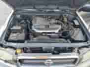 2004 Nissan Pathfinder SE z VIN JN8DR09Y54W902795, wystawiony jako Copart lot #63010235 z przebiegiem 162 641 mil mil oraz Szkoda całkowita • Salvage title. Historia ofert i sprzedaży dostępna na DreamBid. Obrazek 12.