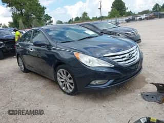 2013 Hyundai Sonata Limited z VIN 5NPEC4AC1DH593051, wystawiony jako IAAI lot #43364603 z przebiegiem 135 632 mil mil oraz . Historia ofert i sprzedaży dostępna na DreamBid. Obrazek 1.