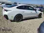 2023 BMW i4 eDrive40 with VIN WBY73AW0XPFP34797, listed as a Copart auction lot 81901885 with 16,966 mi miles and Salvage title. Bid and sale history available at DreamBid. Image 3.