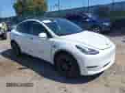 2023 Tesla Model Y Long Range with VIN 7SAYGDEE9PA033911, listed as a IAAI auction lot 43202182 with 35,938 mi miles and . Bid and sale history available at DreamBid. Image 1.