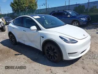 2023 Tesla Model Y Long Range with VIN 7SAYGDEE9PA033911, listed as a IAAI auction lot 43202182 with 35,938 mi miles and . Bid and sale history available at DreamBid. Image 1.