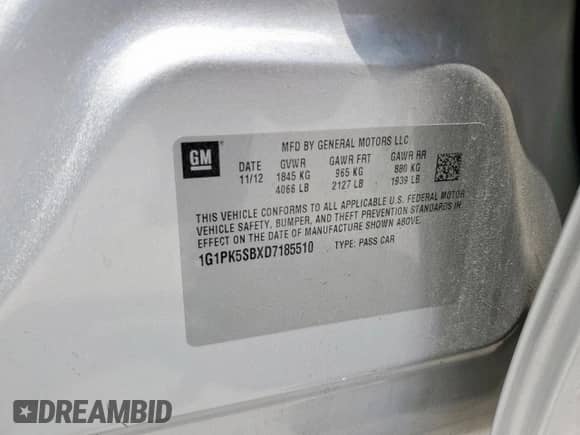 2013 Chevrolet Cruze LT with VIN 1G1PK5SBXD7185510, listed as a Copart auction lot 68091935 with 105,873 mi miles and Salvage title. Bid and sale history available at DreamBid. Image 12.