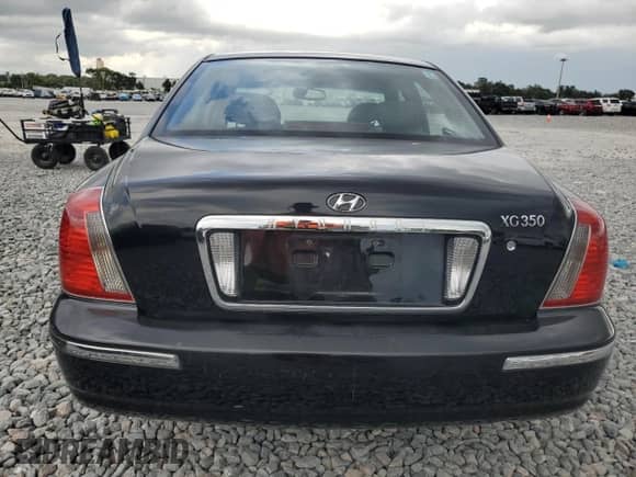 2005 Hyundai XG z VIN KMHFU45E75A411547, wystawiony jako Copart lot #63021495 z przebiegiem 98 767 mil mil oraz Czysty tytuł • Clean title. Historia ofert i sprzedaży dostępna na DreamBid. Obrazek 6.