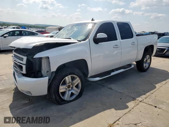 2007 Chevrolet Silverado 1500 2LT with VIN 3GCEC13J77G520256, listed as a Copart auction lot 67581115 with Not provided miles and Salvage title. Bid and sale history available at DreamBid. Image 1.