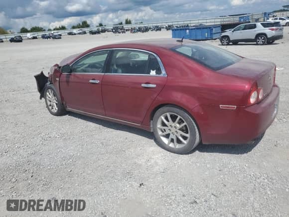 2008 Chevrolet Malibu LTZ with VIN 1G1ZK57728F255493, listed as a Copart auction lot 68514685 with 128,440 mi miles and Salvage title. Bid and sale history available at DreamBid. Image 2.